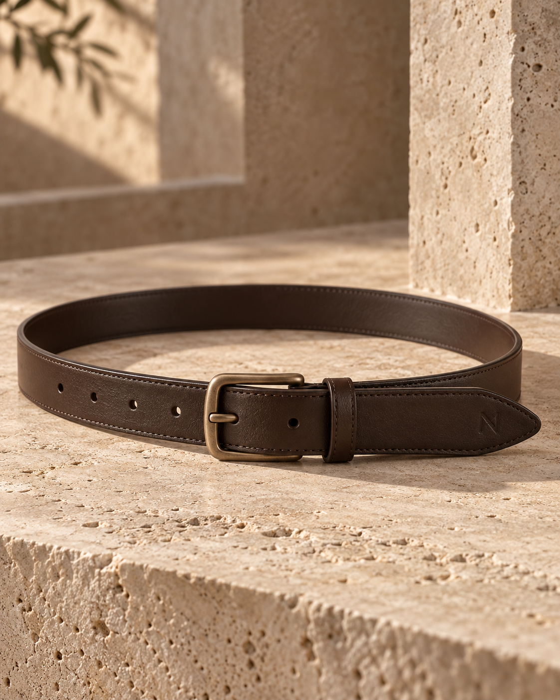 Design preview: espresso CONTOUR belt with a warm bronze-tone rounded buckle.