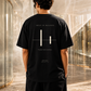 ESSENTIAL 011 — HELD IN BALANCE — back view